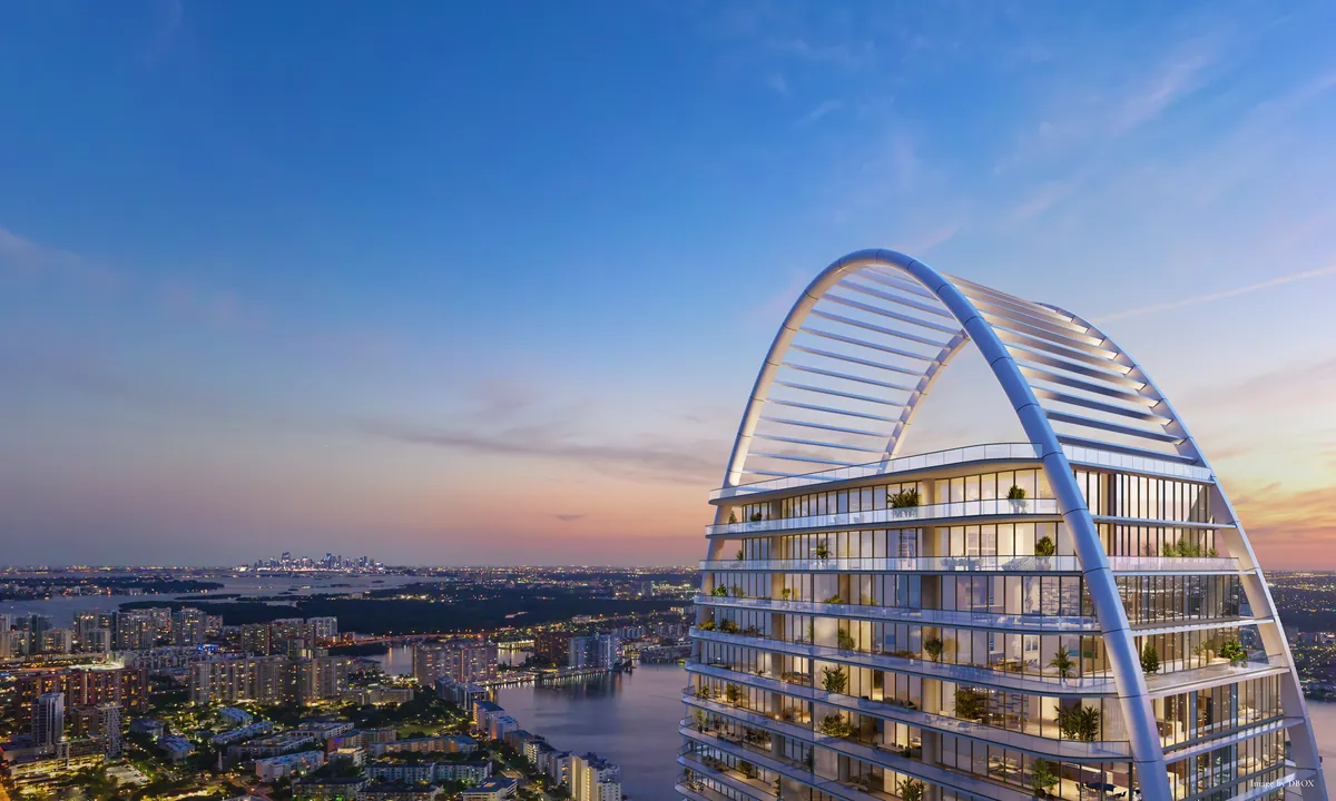 Rendering of the arched crown of a St. Regis tower at dusk